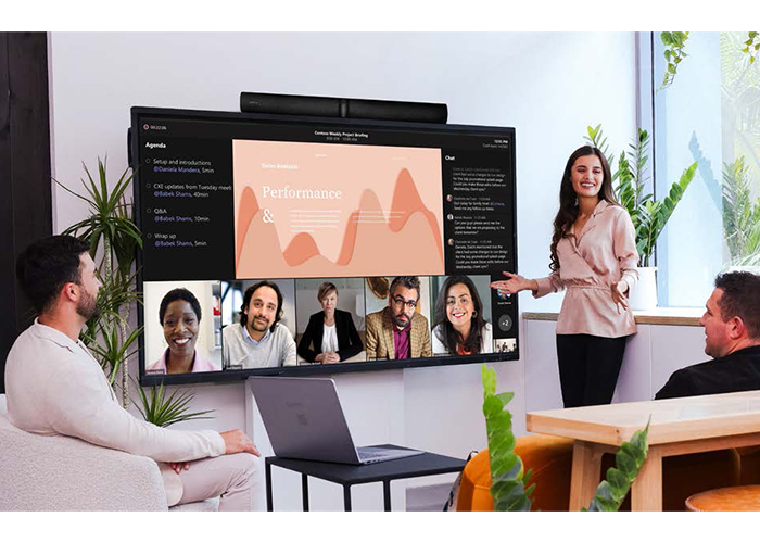 CommBox Classic S4 4K interactive touchscreen with Jabra Panacast video conferencing camera in a meeting room